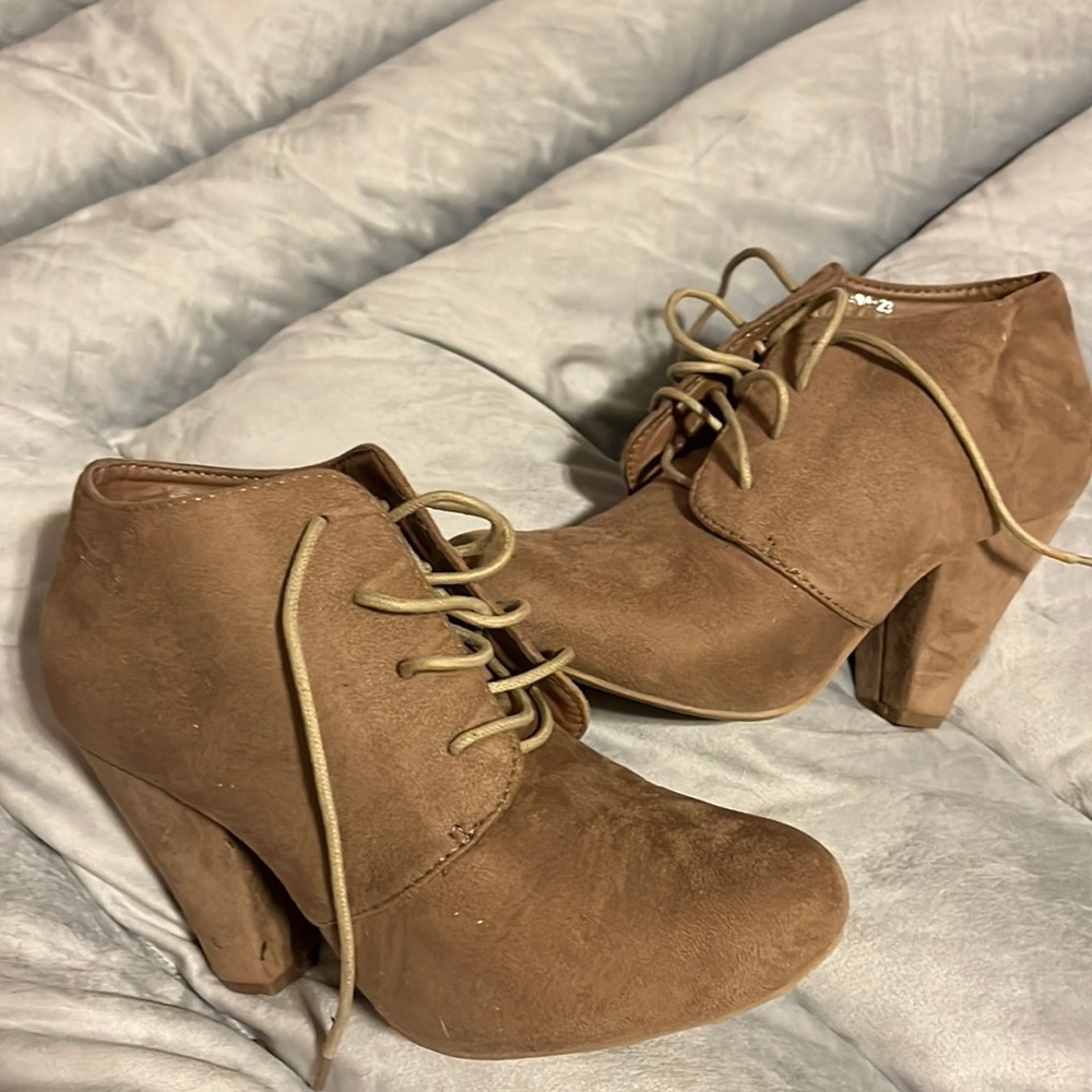 Short heel brown booties